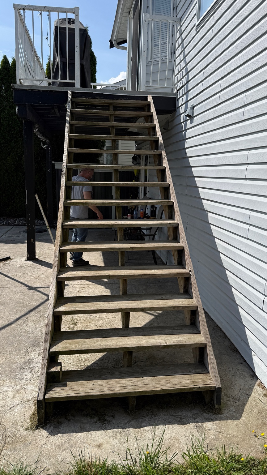 Weathered outdoor timber stairs before rebuilding